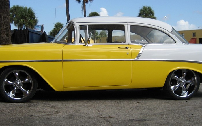 Yellow and white Chevrolet Bel Air coupe