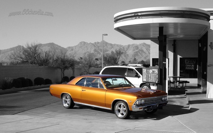 Orange 1966 Chevrolet Chevelle parked at a drive-thru restaurant