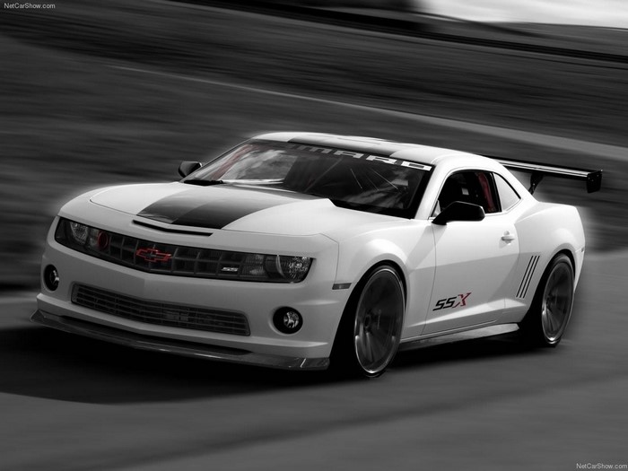 White Chevrolet Camaro SSX with racing stripes and spoiler