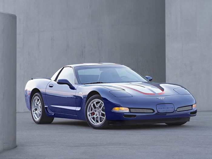 Blue Chevrolet Corvette C5 with racing stripes
