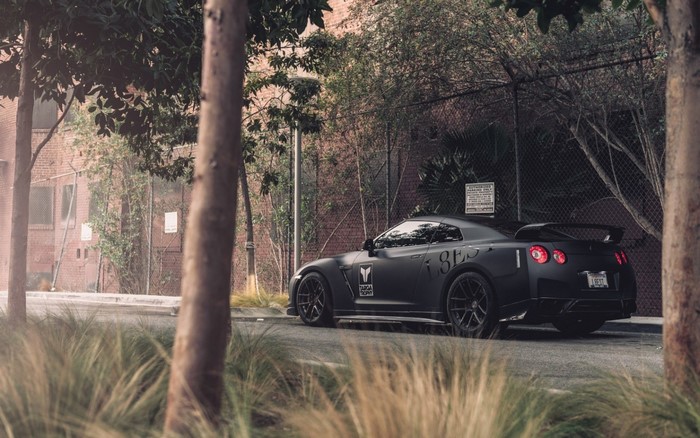 Matte black Nissan GT-R R35 parked on a street