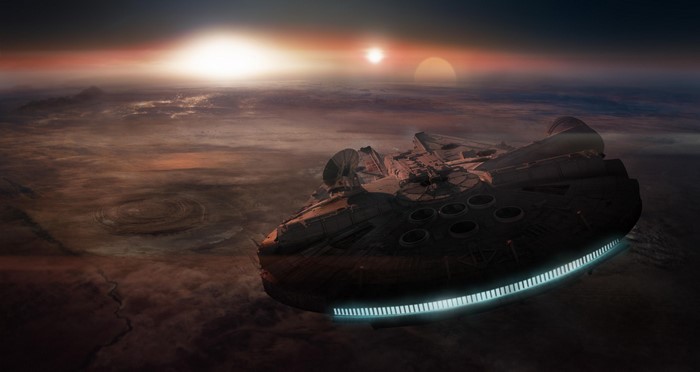 Millennium Falcon flying over a planet at sunset