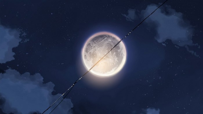 Full moon in the night sky with clouds and stars
