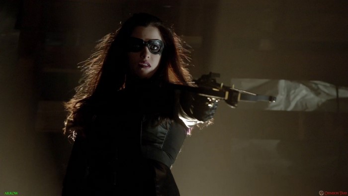 Huntress from Arrow holding a crossbow