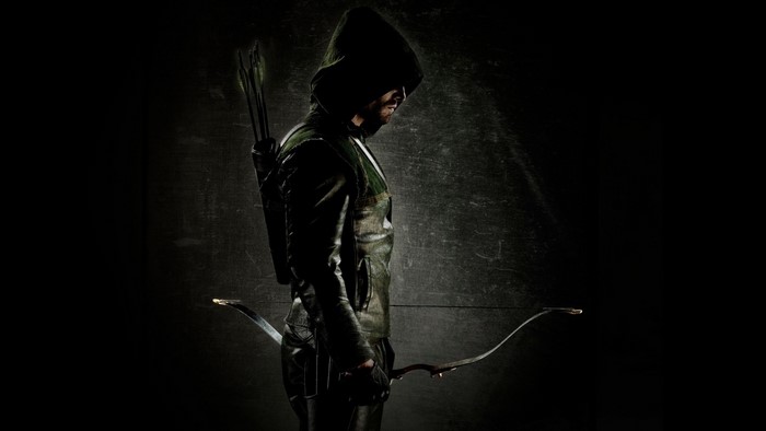 Oliver Queen from Arrow holding a bow