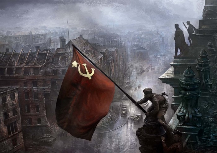 Soldiers raising the USSR flag over a destroyed city