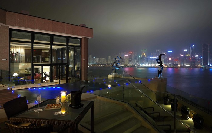 Modern house with city view at night