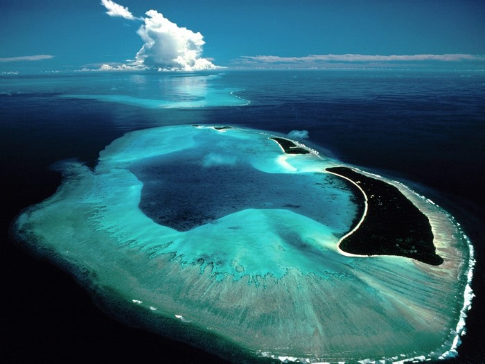 Aerial view of a tropical island atoll in the ocean