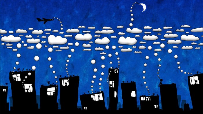 Night city skyline with clouds and airplane