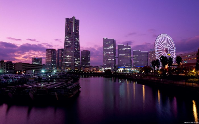 Yokohama cityscape at dusk with Landmark Tower and Ferris wheel