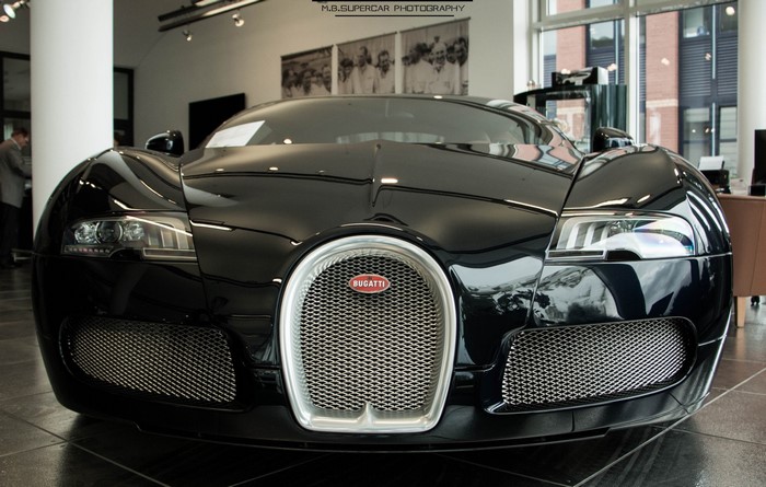 Black Bugatti Veyron in a showroom