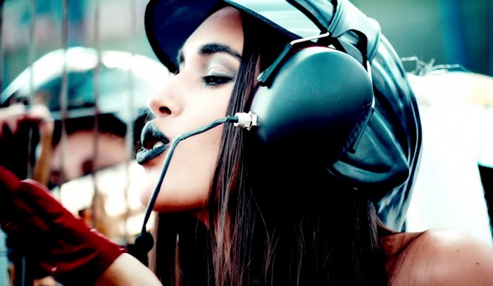 Woman with black lipstick and headphones