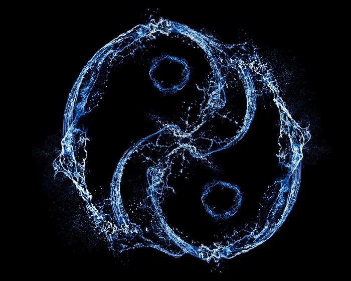 Yin and Yang symbol made of water splashes