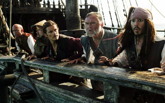 Jack Sparrow and crew on a ship deck