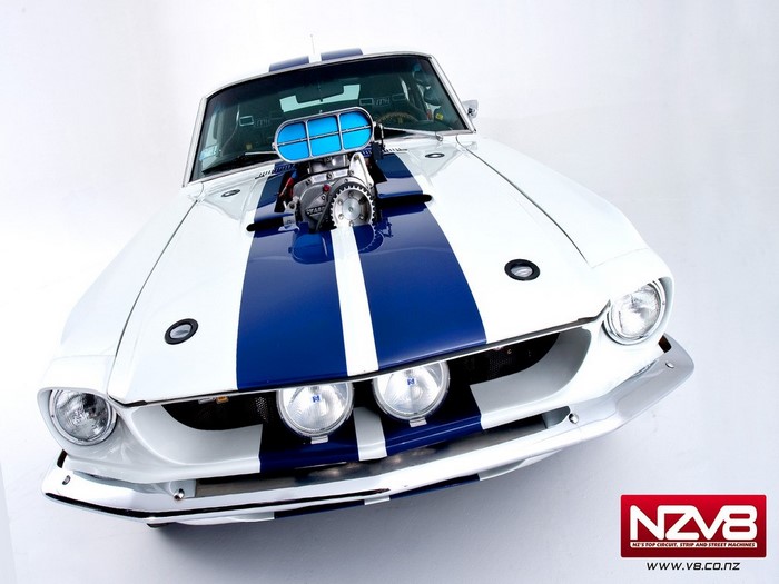 White Ford Shelby Mustang with Blue Stripes and Supercharger