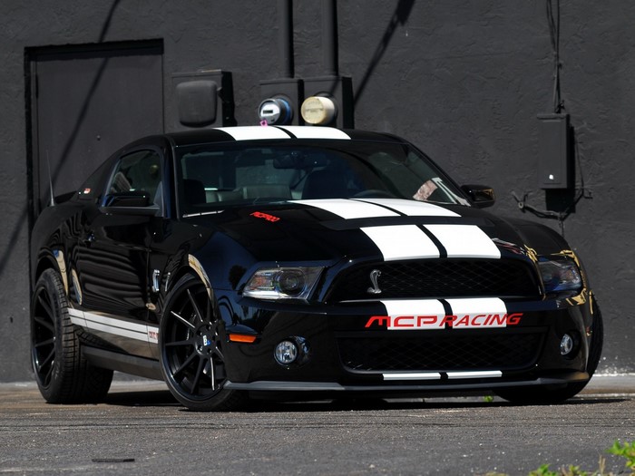 Black Shelby GT500 with white racing stripes