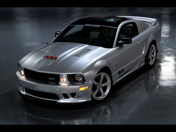Silver SMS Shelby Mustang parked indoors