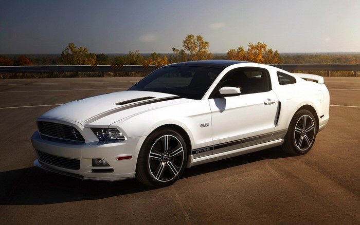 White Ford Mustang GT/CS parked on asphalt