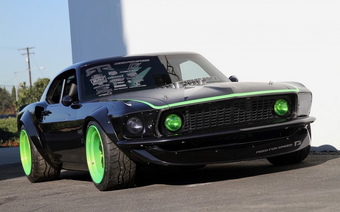 Customized black Ford Mustang with green accents
