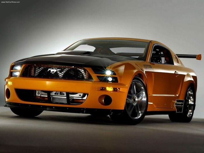 Orange Ford Mustang GTR with racing spoiler