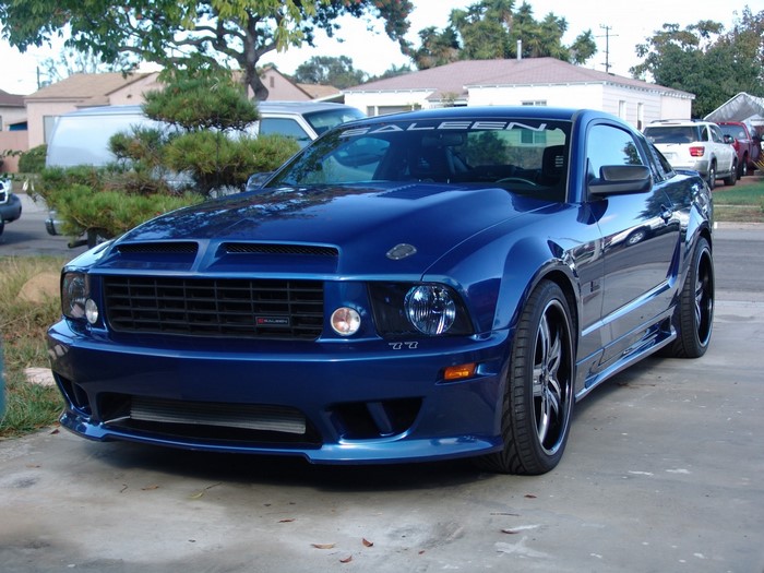 Blue Saleen Ford Mustang parked on driveway
