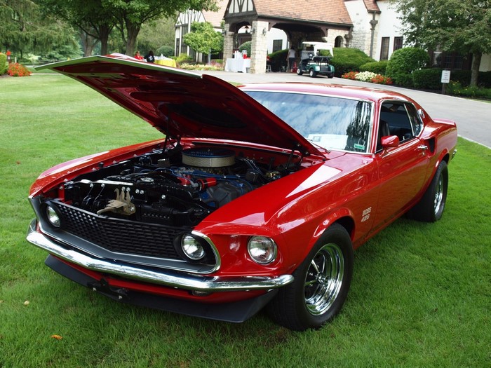 Red 1969 Ford Mustang Boss 429 with hood open