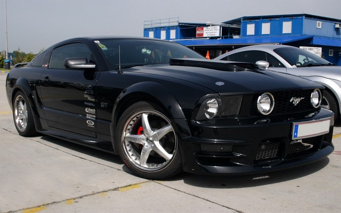 Black Ford Mustang GT with custom rims