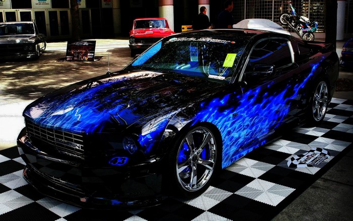 Custom Ford Mustang with blue flames