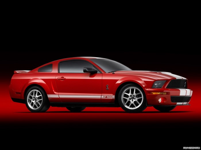 Red Ford Mustang Shelby GT500 with White Stripes