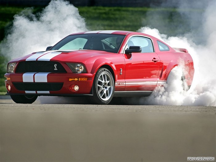 Red Ford Mustang Shelby GT500 Burnout