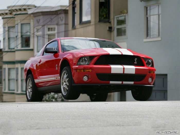 Red Shelby Mustang GT500 on a San Francisco street