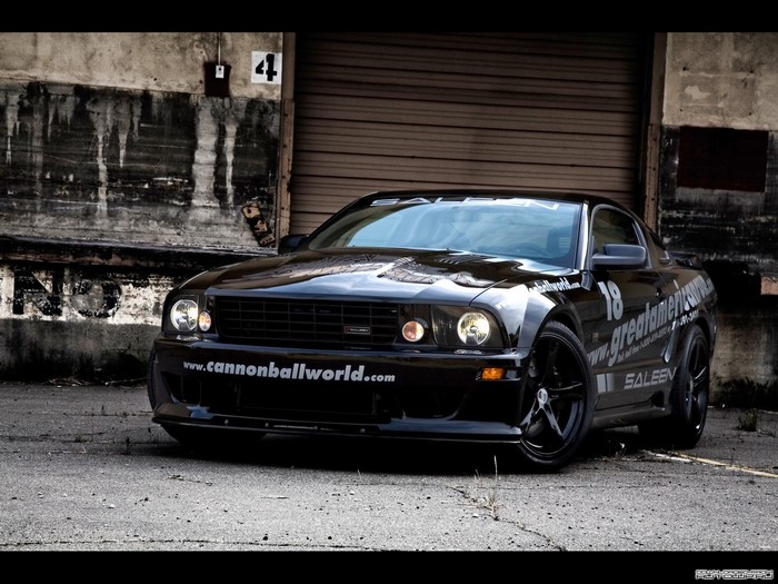 Black Saleen Mustang with "cannonballworld.com" and "greatamericanrun" decals
