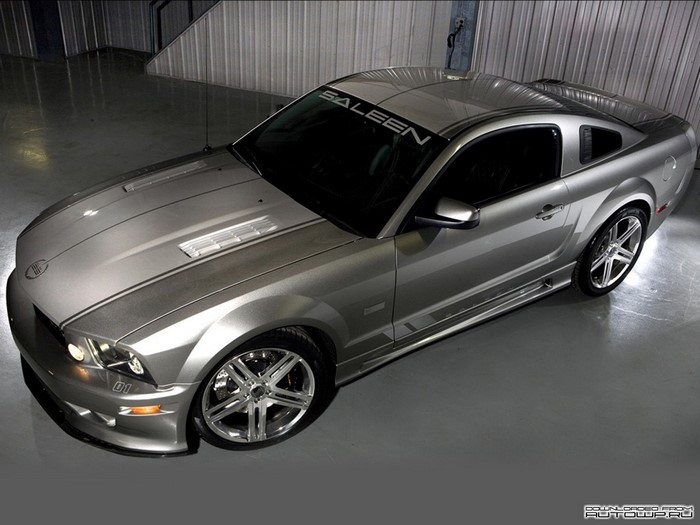 Silver Saleen Ford Mustang parked indoors