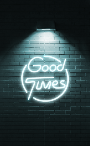 Neon sign with "Good Times" text on a brick wall