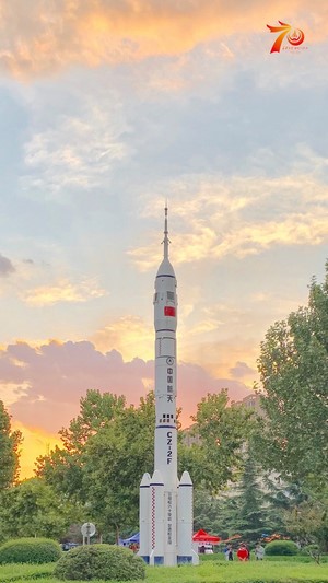 Long March 2F rocket model at sunset