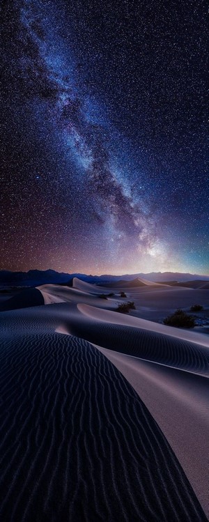 Milky Way over sand dunes at night
