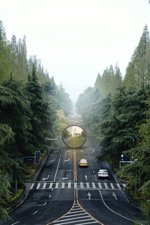 Road with trees and a circular mirror in Nanjing