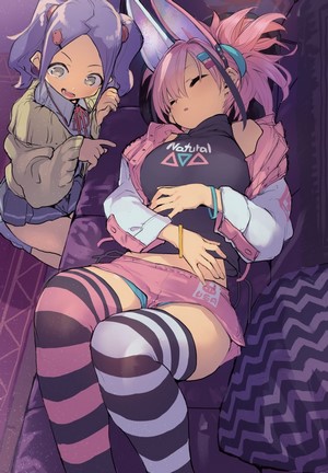 Two anime girls with bunny ears on a couch