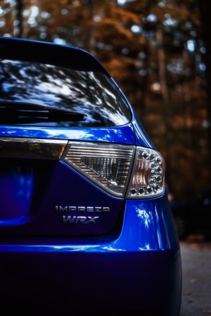 Blue Subaru Impreza WRX Hatchback