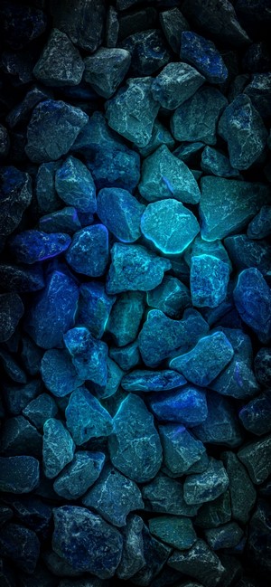 Close-up of blue and teal glowing stones