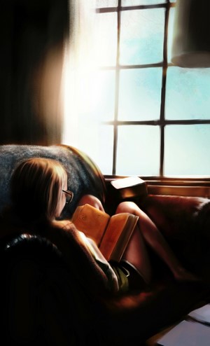 Woman reading a book by the window