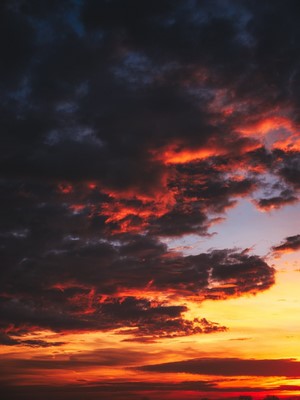Dramatic sunset sky with fiery clouds