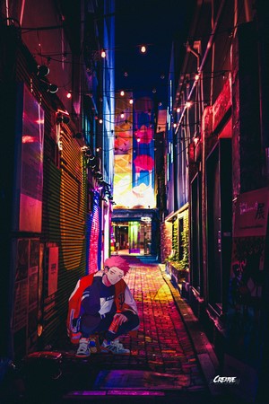 Anime boy in alleyway with string lights