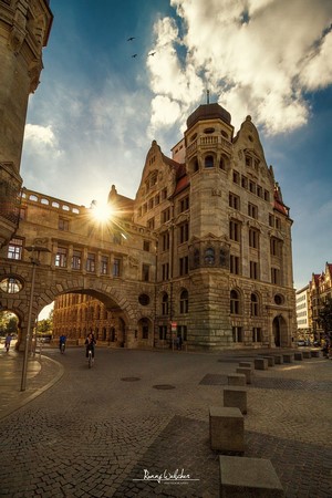 Old Building with Arch and Sun Rays in Leipzig