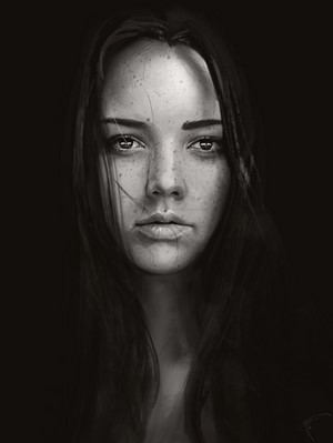Monochrome portrait of a woman with freckles