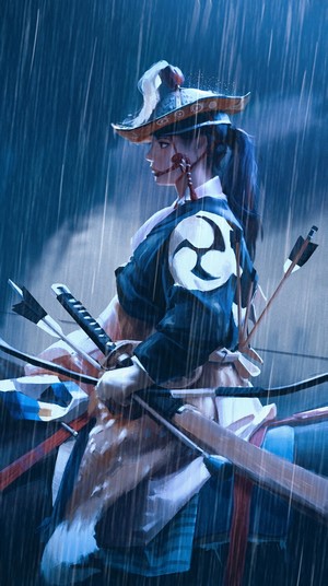Archer in traditional Japanese attire in the rain
