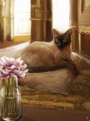 Siamese cat with a necklace on a pillow