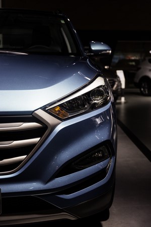 Blue Hyundai Tucson car front detail