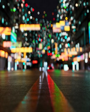 Blurred City Street at Night with Bokeh Lights