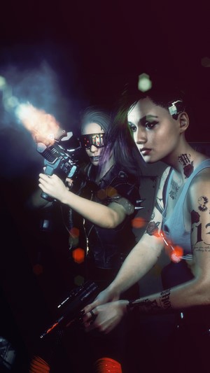 Judy Alvarez and friend with guns in Cyberpunk 2077